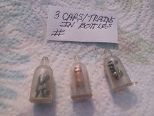 VINTAGE RARE GUMBALL/VENDING CARS/TRAINS IN BOTTLE CHARMS/TOYS LOT OF 3