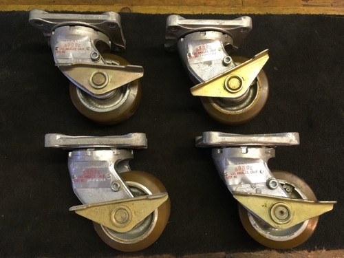 (4) AEROL S5-0-6-IL4 locking swivel casters in great condition....4” wheels.