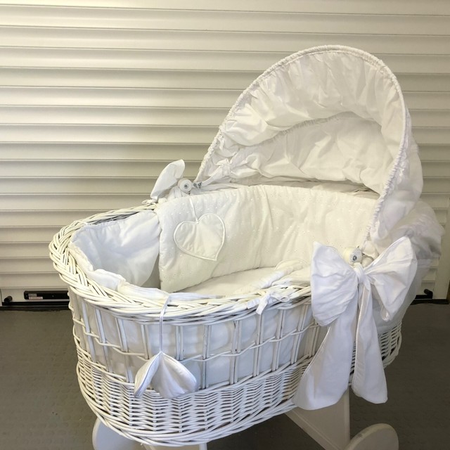 white wicker crib