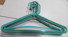 CLOTHS HANGERS..LOT OF 12.... 17" ACROSS.  SHADES OF GREEN