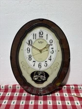 Wood Frame Pendulum Wall Clock - Plays Melodies on the Hour
