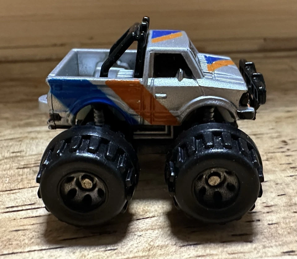 Vintage Micro Machines Datsun Pickup 4x4 Monster Truck 1.25" Scale Model Silver - Image 4 of 4