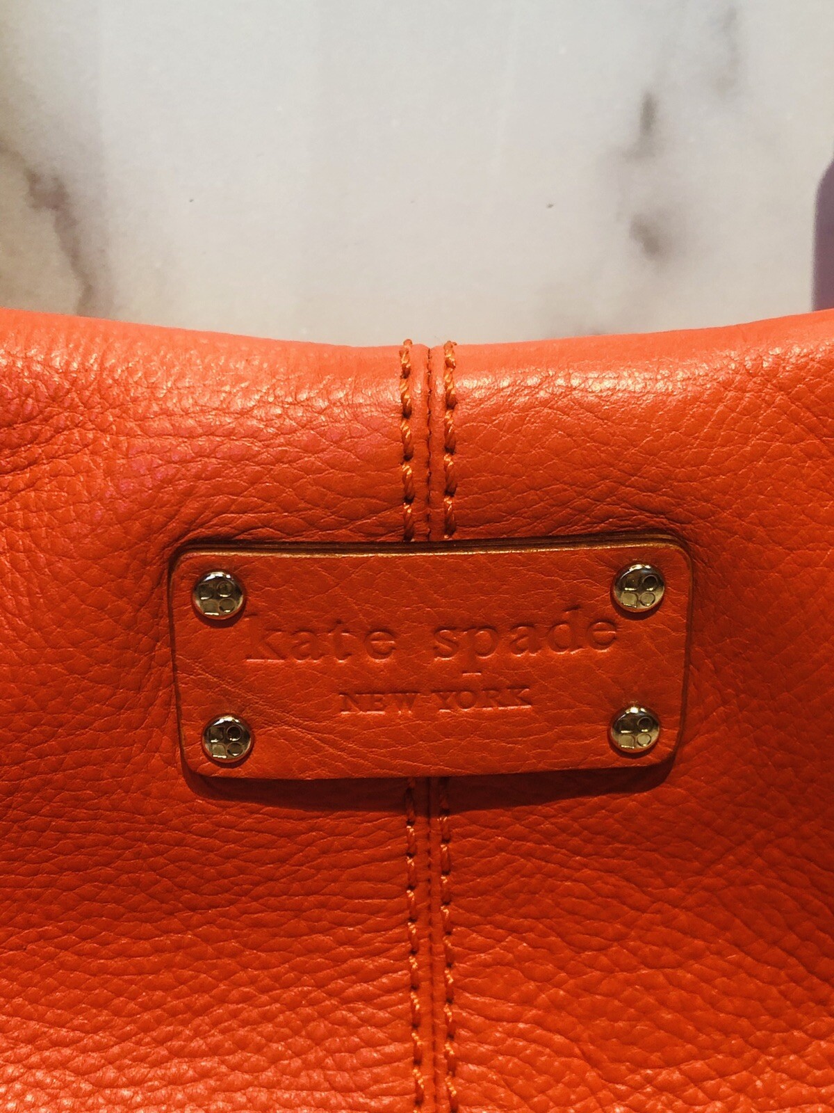 kate spade brown purse with tassel