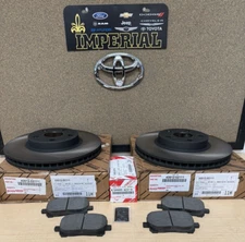 2003-2007 TOYOTA COROLLA GENUINE OEM NEW FRONT BRAKE ROTORS AND TCMC BRAKE PADS