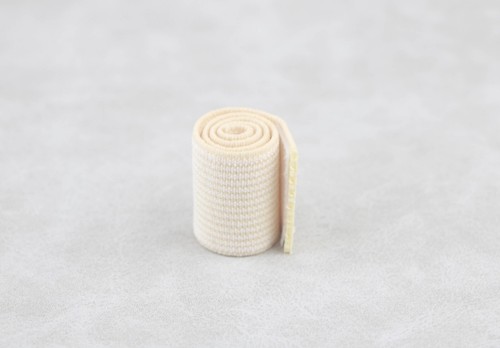 A first aid bandage for 18'' doll