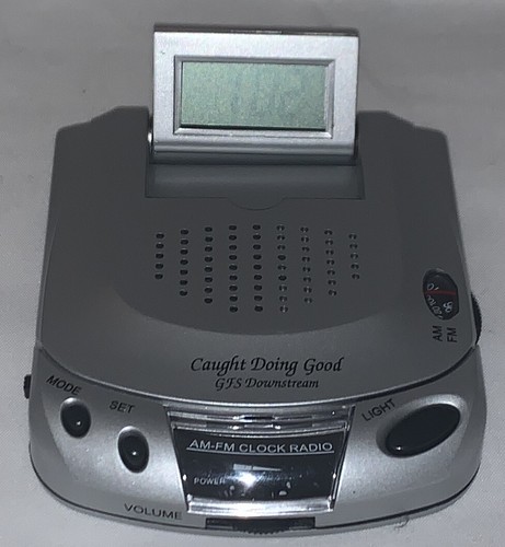 Mini radio orologio da tavolo AM/FM con auricolari cablati - Foto 1 di 6