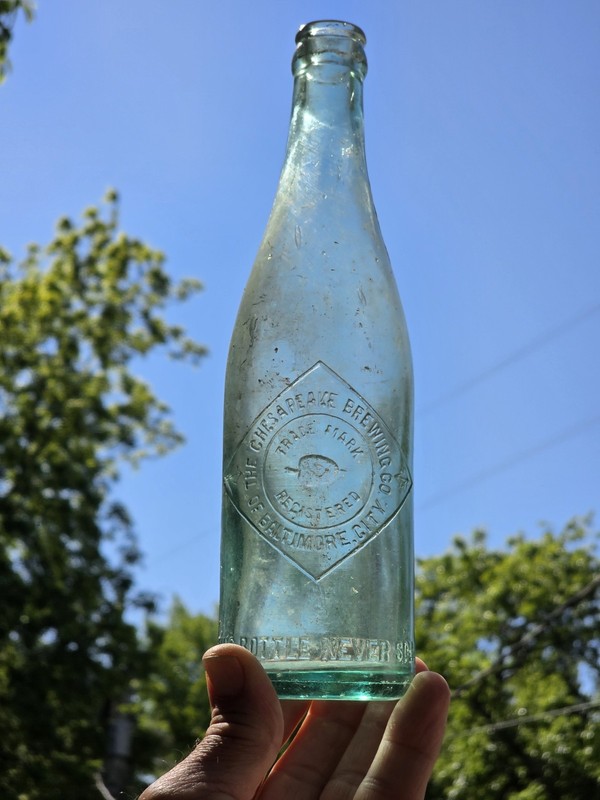 The Chesapeake Brewing  Co. Of Baltimore, Md.   Embossed Turtle Beer Bottle 1of3