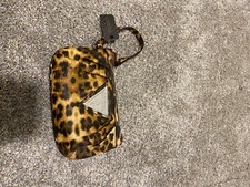 Guess wristlet. Brand new with tags.
