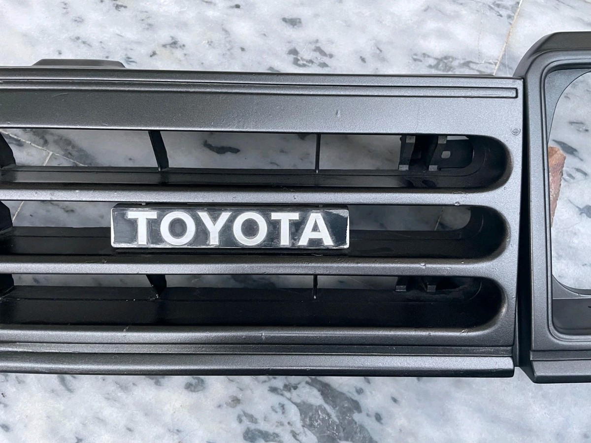 Toyota Starlet KP61 1982-1984 headlight bezels+radiator Grill