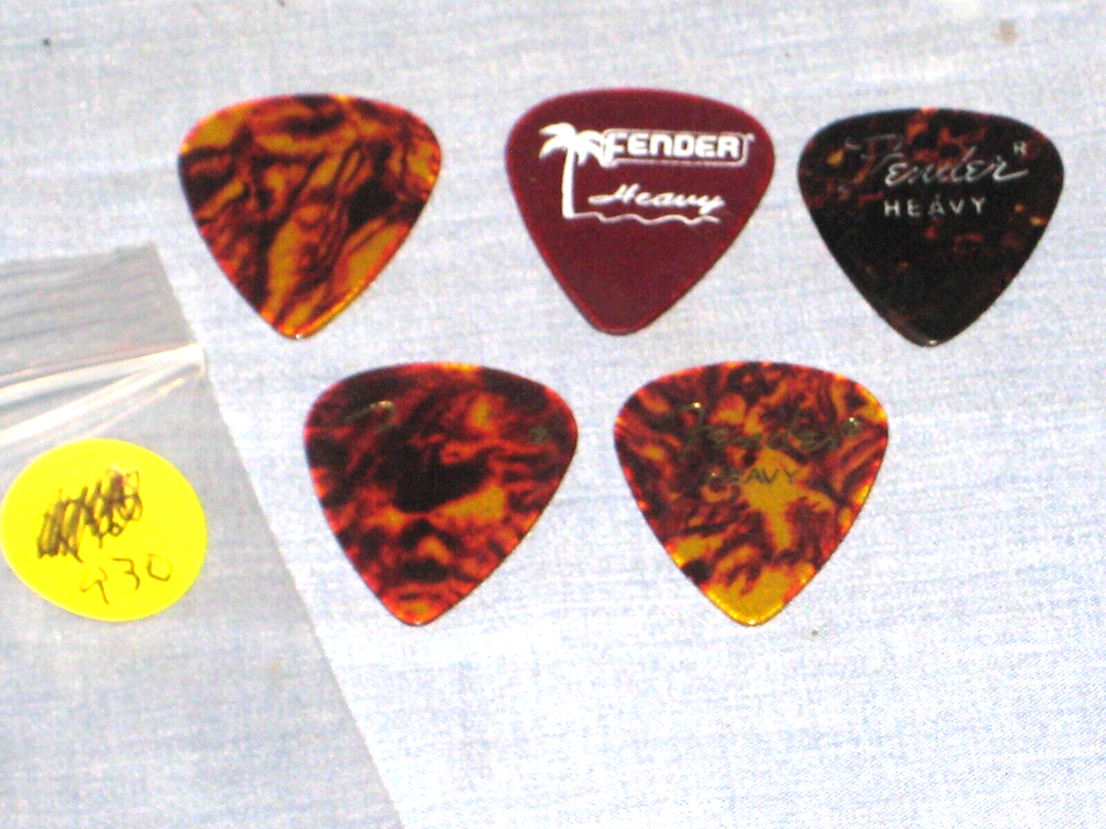 #930* - LOT OF FIVE FENDER HEAVY GRADE PLASTIC GUITAR PICKS