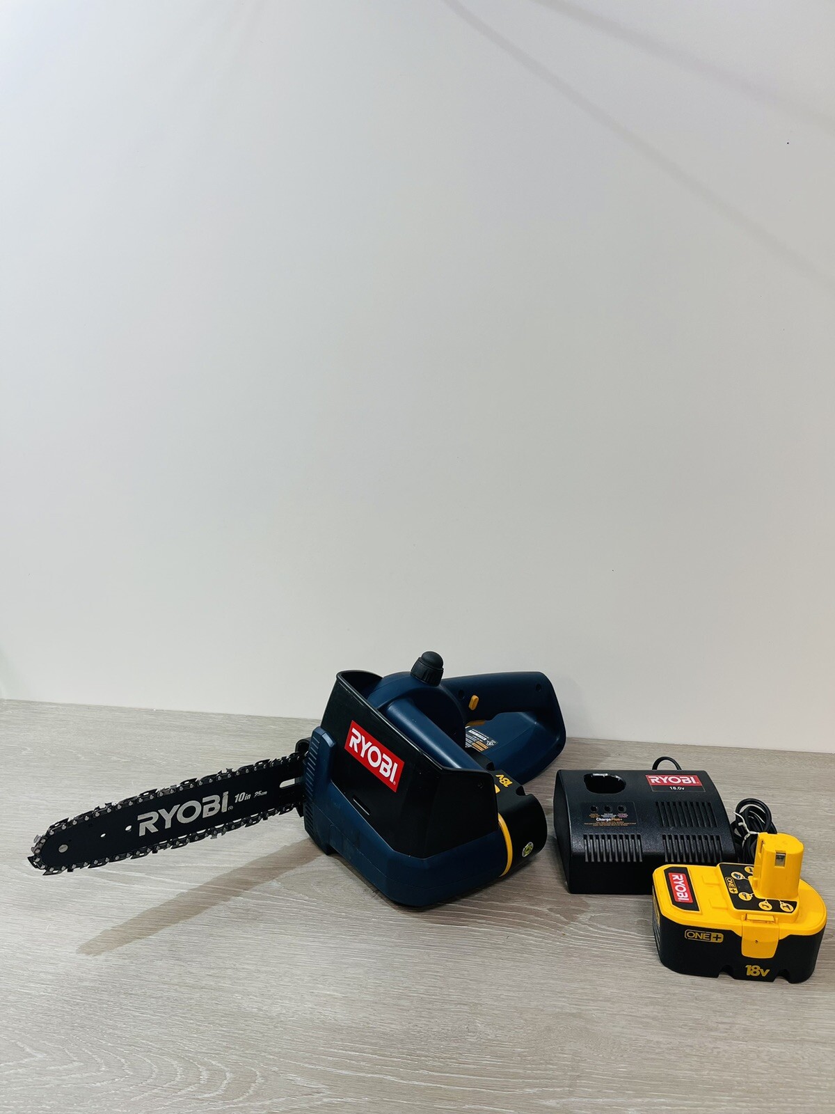 Ryobi 18V Cordless Chainsaw P540 with Charger and 2 Tested Batteries