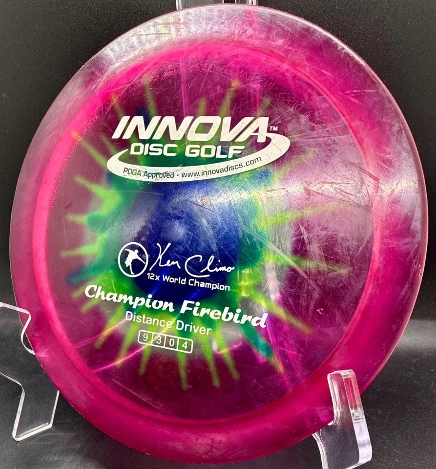 Disco de golf Innova Champion Firebird FAF plano y firme - 12x KC - rígido IDye clásico Foto 3 de 4