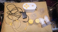 Medela Pump-In-Style Breast pump with attachments and carrying case