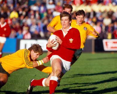 John Devereux of Wales tries to evade Matt Burke of Australia dur - Old Photo