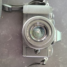 Olympus OM-D Mirrorless Interchangeable Lens Camera with Lumix G 25mm f/1.7 Lens