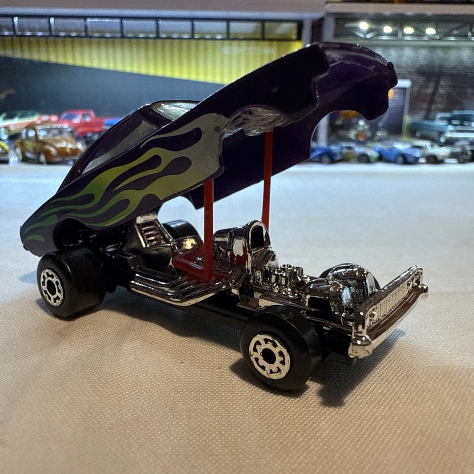 CARGADOR MATCHBOX NARANJA CÁSCARA DODGE CARAMELO PÚRPURA VERDE-BLANCO LLAMAS SUELTAS Foto 3 de 4