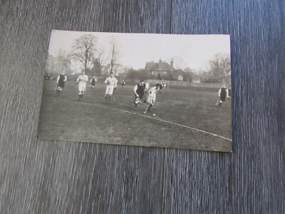 A set of three framed Cambridge University Hockey team photos from the