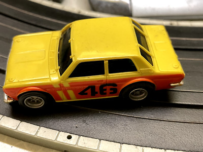 FALLER AMS/AURORA Bre Datsun 510 AFX gelb/rot - gut gebraucht - Neue Silikon HR