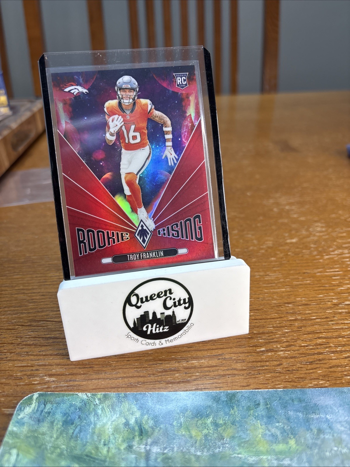 2024 Panini Phoenix Rookie Rising Troy Franklin #RR-TFN Red /99 (RC)