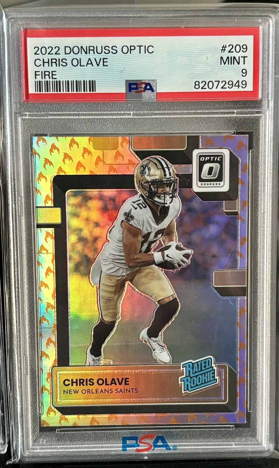 2022 Donruss Optic Chris Olave Fire Emoji Prizm Rookie SSP Saints RC 209