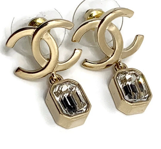 Authentic CHANEL CC gold earrings with dangling crystals