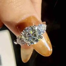 3Ct Round Cut VVS1 Moissanite Three Stone Engagement Ring 14K White Gold Plated