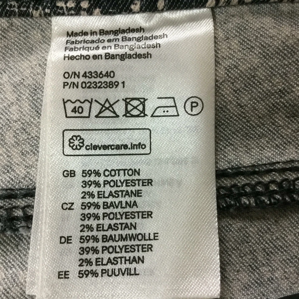 Pantalones para mujer H&M ajustados de pierna tiro medio blanco y negro con estampado de argyle cintura 8 28 Foto 4 de 4