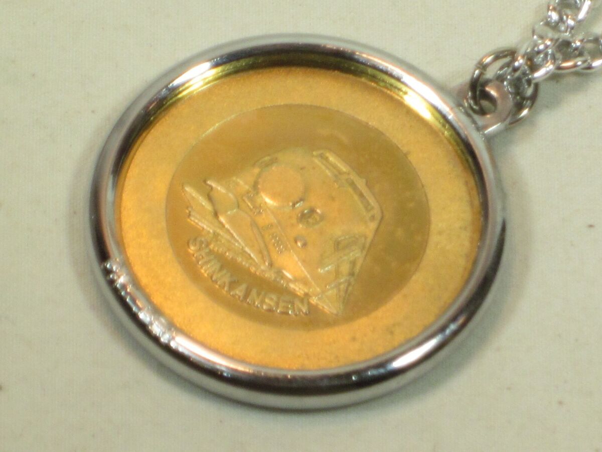 rare Shinkansen C 57135 medallion medal train engine detail