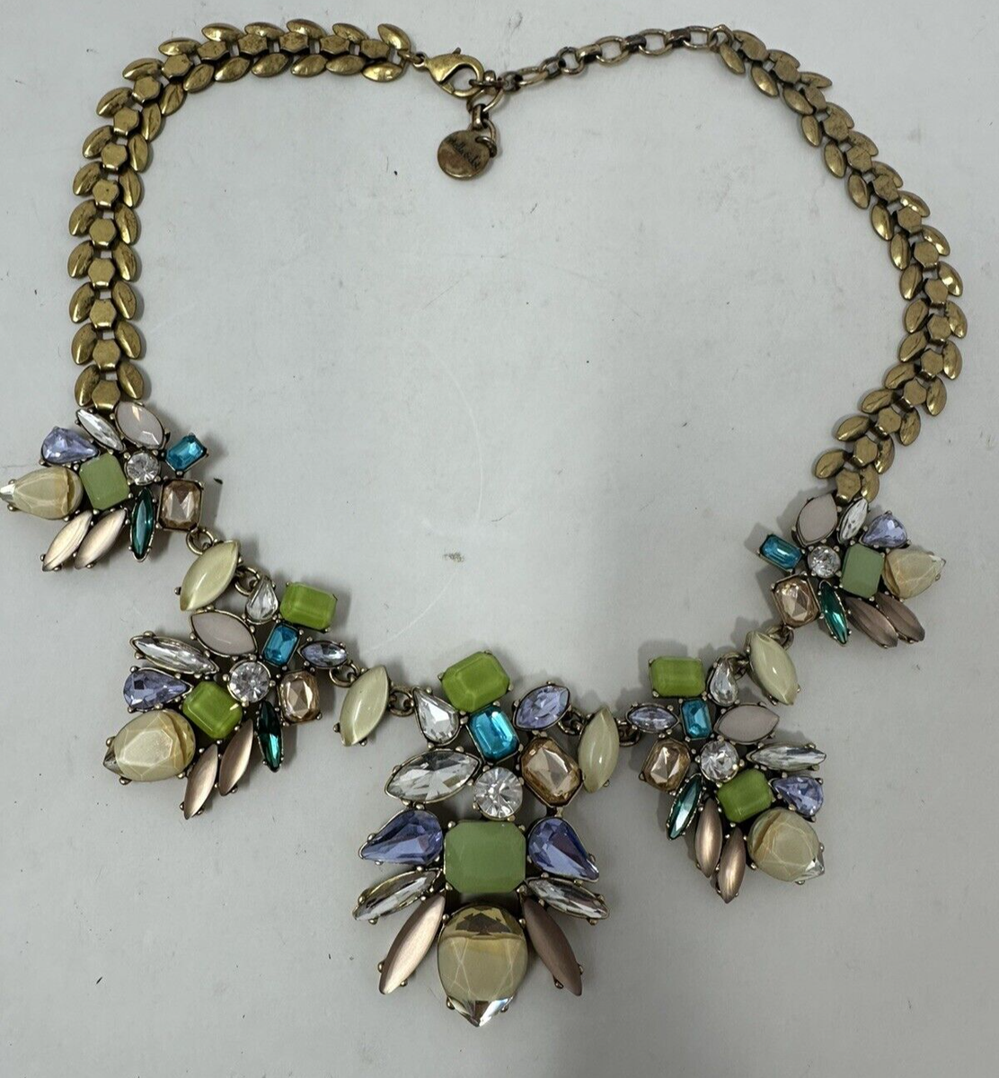 Stella and Dot brass tone floral design statement necklace in green and 