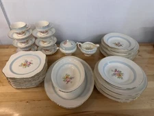 Homer Laughlin Eggshell Nautilus 6 plate settings plus serving pieces