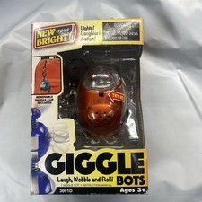 New Bright Giggle Bots 3001D Orange Disco Dancer Robot Toy NIB Dangle Clip