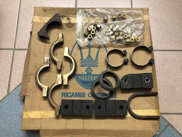 Maserati Khamsin Brass exhaust joints w/ donuts, hangers & bag of brass hardware