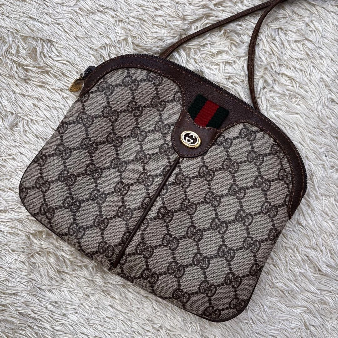 Sac à bandoulière Gucci GG motif intégral ligne sherry logo cuir marron beige gg