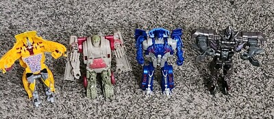 4 Transformers Action Figures 