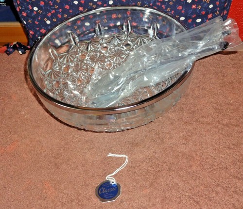 A MAYELL PRODUCT CLASSIS STAINLESS CHROME PLATED GLASS SALAD BOWL + SERVERS
