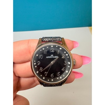 Anne Klein Womens Watch Y121E Black Dial Crystal Markers Metallic Scale Strap