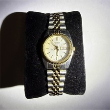 Seiko Quartz Women  s Wristwatch Two-Tone Stainless Steel Band Gold Bezel Date