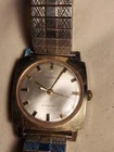 Vintage Timex Electric Wrist Watch Men Gold Tone Stretch Analog Used