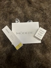NEW Modere Set: Trim Spoon Gold, Glass Flask, Bag. Brand New.