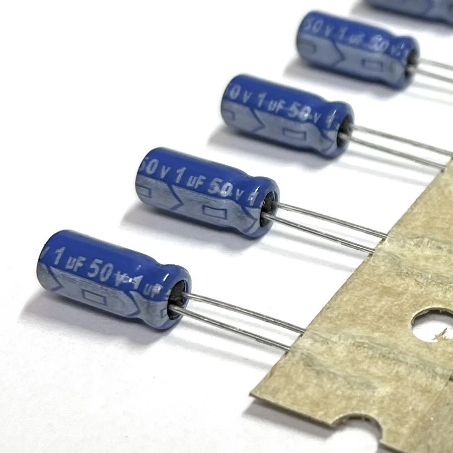 (PKG de 20) Condensador Electrolítico 1uF 50V, Radial, 85°C, Serie SURGE REA Foto 2 de 4