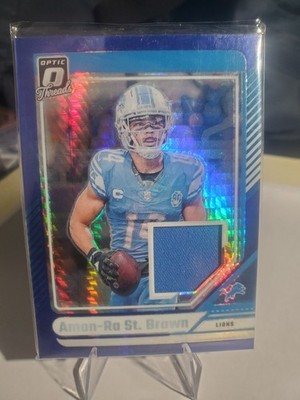 2024 Panini Donruss Optic Threads Amon-Ra St. Brown #DTB-ASB