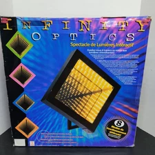 Can You Imagine Infinity Optics Interactive Light Show Mirror Black and Orange