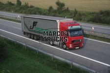 Truck photo Volvo FH tarpaulin trailer Poland red DELTA TRANS #b4wk