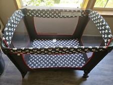 Disney Portable Play Yard with Removable Bassinet Storage Organizer Black/Red