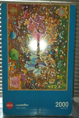 Heye ''Dreieck'' Puzzle 2000 Teile: Mordillo - The Kiss  2015