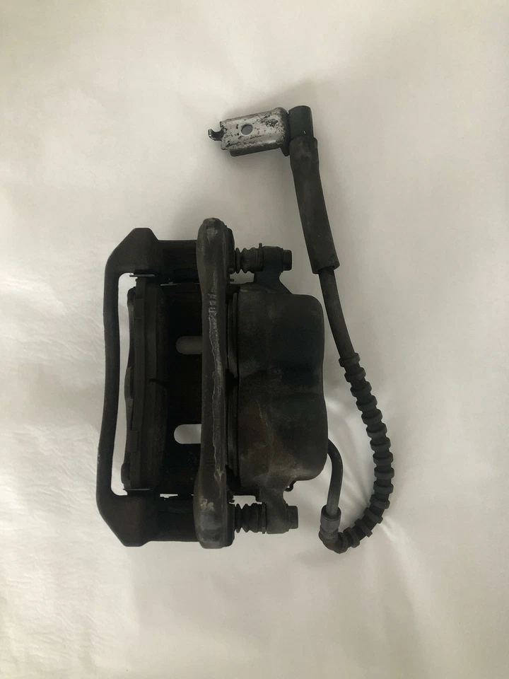 Pinza de disco de freno delantera Ford Ranger 2006-2011 3,0 L A/T lado del conductor izquierdo G Foto 4 de 4