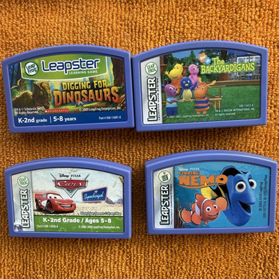 LeapFrog Leapster Lot 4 Game Cartridges: Dinosaurs Backyardigans Cars Nemo
