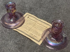 Vintage Fenton pink iridescent glass candle holders' dolphins, pair
