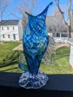 This collectible item is a vintage-style Murano art glass sculpture depicting a