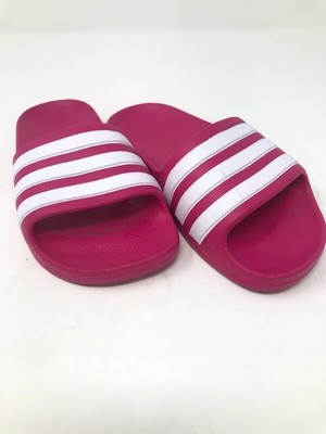 pink and white adidas sliders